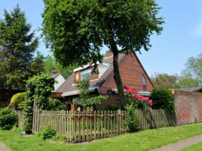 A detached holiday home on the edge of a spaciously designed holiday park